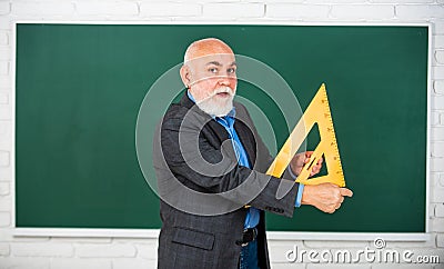 Master the Key Concepts. back to school. mathematics and people concept. Mathematics at board. favorite subject. senior Stock Photo