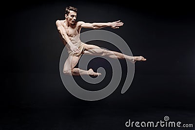 Masterful ballet dancer showing her abilities in the air Stock Photo