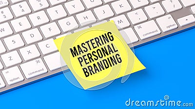 Mastering Personal Branding text on sticky note, computer keyboard. Stock Photo