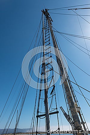 Fishing boat masts and outriggers Stock Photo