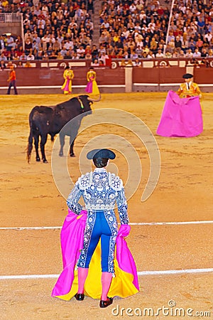 Matador and bull in bullfighting at Madrid Editorial Stock Photo