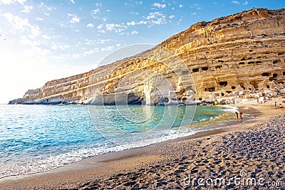 Matala beach with caves on the rocks, Crete, Greece. Stock Photo