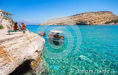 Matala beach with caves on the rocks, Crete, Greece Editorial Stock Photo