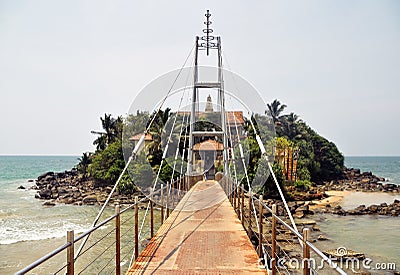 Matara/SRI LANKA - March 24 2018: Paravi Duwa Temple Ðžver the ocean bridge to the temple Editorial Stock Photo