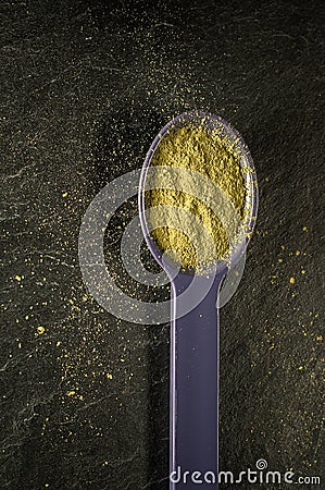 Matcha tea in a spoon Stock Photo