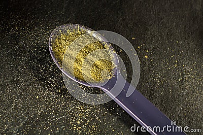 Matcha tea in a spoon Stock Photo