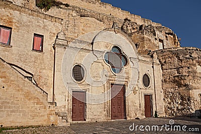 Matera, Basilicata, Italy: the medieval rock church San Pietro Barisano carved into the tuff, in the old town Stock Photo