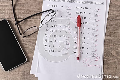 Math Test On Teacher Desk Stock Photo