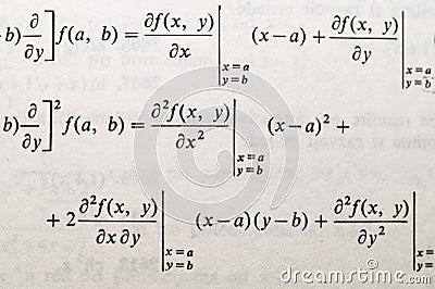 Mathematical Formulas and Equations in Textbooks Featuring Integrals, Square Roots, and Parametric Functions Stock Photo