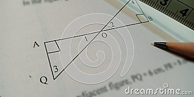 mathematical geometric diagram displayed on white paper sheet with black pencil pointer Stock Photo