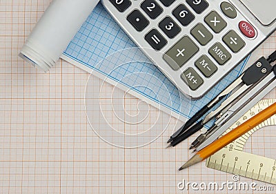 Mathematical instruments over the corner of a math graph paper with copy space for text. Math graphic tools concept Stock Photo