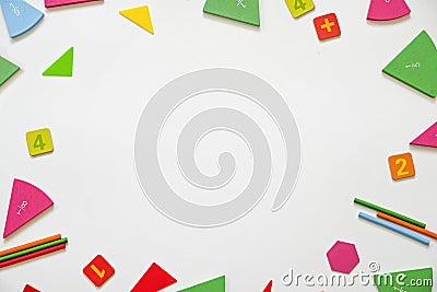 Mathematics background - fractions on white table, close up. Dividing fractions, math concept. Top view Stock Photo