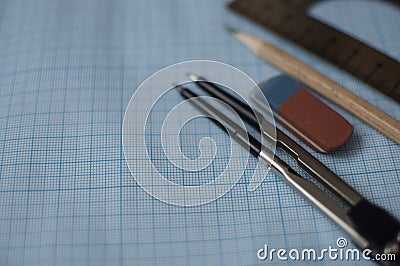 Mathematics geometry tool for student in math class with copy space for text on paper graph background Stock Photo