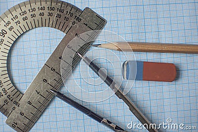 Mathematics geometry tool for student in math class with copy space for text on paper graph background Stock Photo