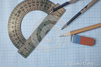 Mathematics geometry tool for student in math class with copy space for text on paper graph background Stock Photo