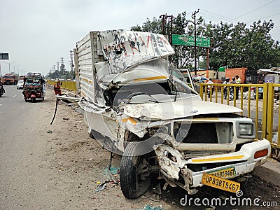 Smashed front end of a car after a road accident. Head on collision is highly fatal for auto drivers and passengers. Editorial Stock Photo