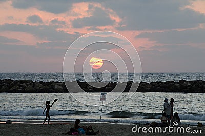 Matkot Beach Tennis in the Evening on a Tel Aviv Beach Editorial Stock Photo