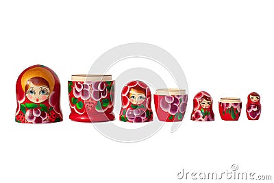 Matreshka Russian doll souvenir bright red, purple and green flowers pattern on white background isolated closeup Stock Photo