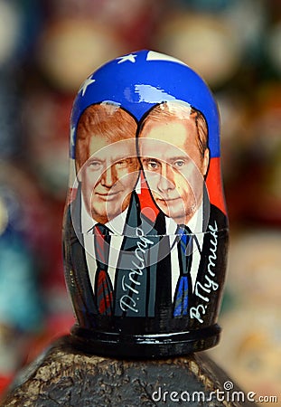 Matryoshka depicting Russian President Vladimir Putin and the 45th President of the USA of Donald trump on the counter of Souvenir Editorial Stock Photo
