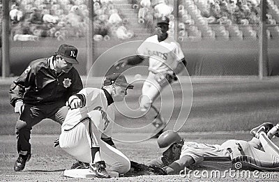 Matt Williams tags out Howard Johnson as he slides into 3rd base Editorial Stock Photo