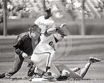 Matt Williams tags out Howard Johnson as he slides into 3rd base Editorial Stock Photo