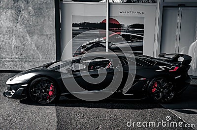 Matte black Lamborghini Aventador SVJ with red accents Editorial Stock Photo