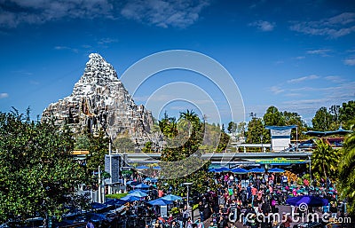 The Matterhorn standing tall amidst a crowd in Disneyland Editorial Stock Photo