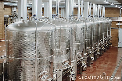 Maturation tanks in modern winery Stock Photo