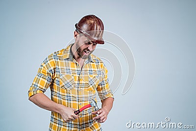 Mature builder in shirt. unshaven man on construction site. building worker in hard hat. labor day. angry guy wear Stock Photo