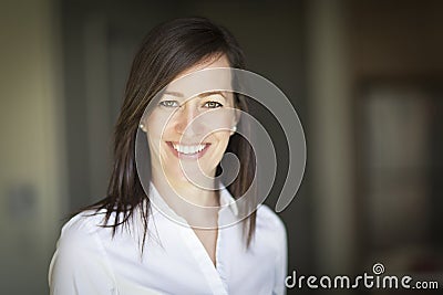 Mature Businesswoman Smiling At The Camera. Working At Home. Stock Photo