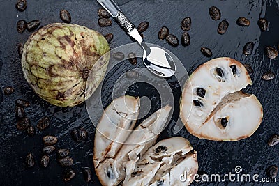 Mature cherimoyas. Whole and open fruit. Stock Photo