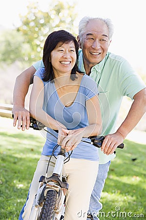 Mature couple bike riding Stock Photo