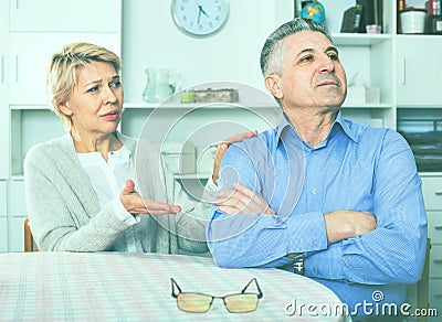 Mature couple decide family matters and find out relationship Stock Photo