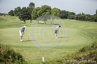 Mature couple golf players Editorial Stock Photo