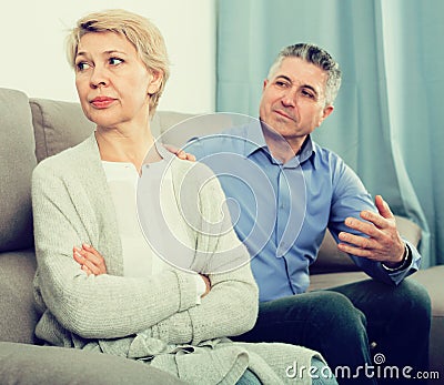 Mature couple quarrels Stock Photo