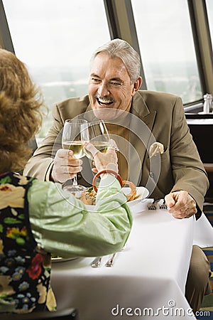 Mature couple toasting. Stock Photo