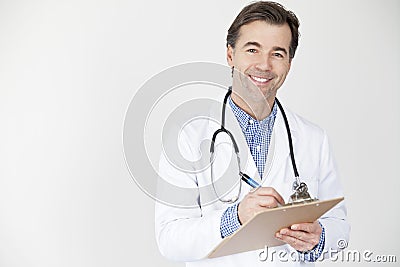 Mature Doctor Smiling At The Camera Stock Photo