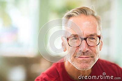 Mature handome fit man sitting outside stock photo Stock Photo