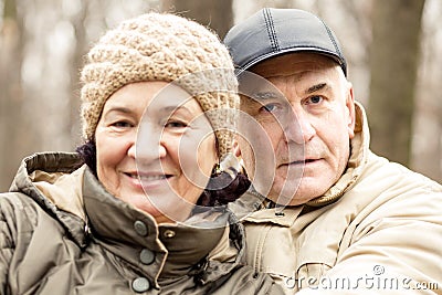 Mature happy smiling couple in the park Stock Photo