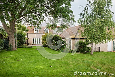 Mature landscaped house garden Editorial Stock Photo