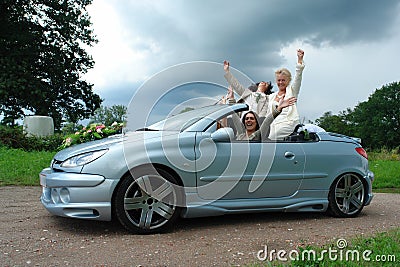 Mature lesbian couple posing after marriage. Stock Photo