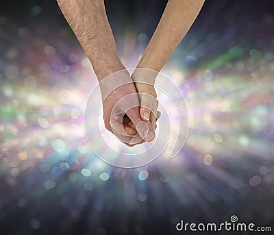 The Energy of Romantic Soulmates holding hands Stock Photo