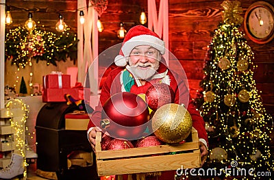 Mature man with white beard. Bearded grandfather senior man celebrate christmas. Grandpa with toys. Winter sale. Elderly Stock Photo