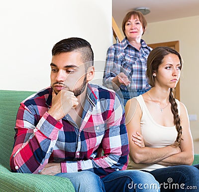 Mature mother dispute with adults children Stock Photo
