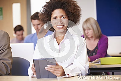 Mature Students In Further Education Class Stock Photo