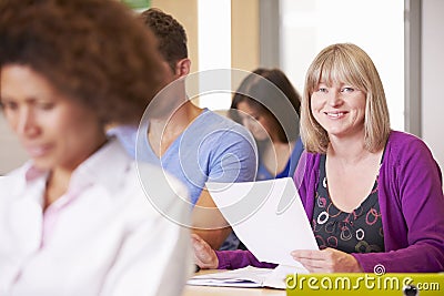 Mature Students In Further Education Class Stock Photo