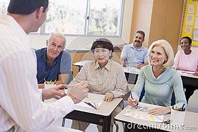 Mature students learning art skills Stock Photo