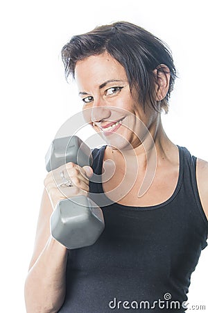 Mature woman lifting weights Stock Photo