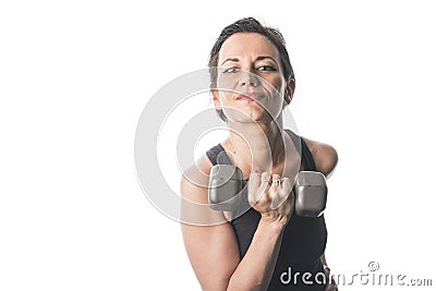Mature woman lifting weights Stock Photo