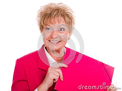 Mature woman with a pink folder Stock Photo